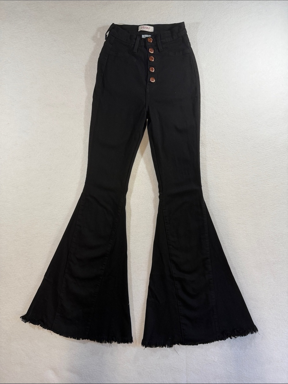 Vibrant Black High-Rise Flared Jeans with Button Front